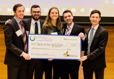 UNC case team with winining check