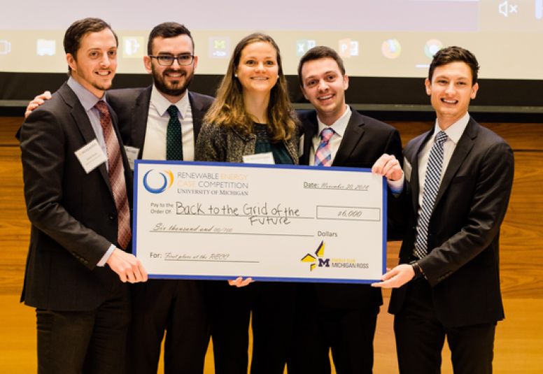 UNC case team with winining check