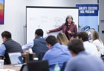 Professor teaching Charlotte EMBA class.