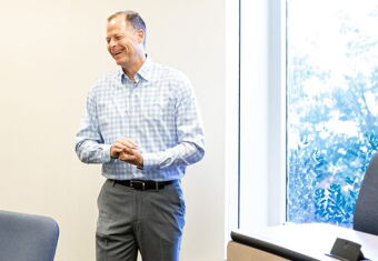 University of North Carolina at Chapel Hill professor Dave Hofmann teaching in a university classroom.