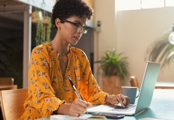women working at computer from home