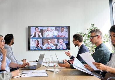 hybrid business meeting in conference room