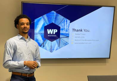 Robbie Tillman presents his final presentation at Wood Partners.