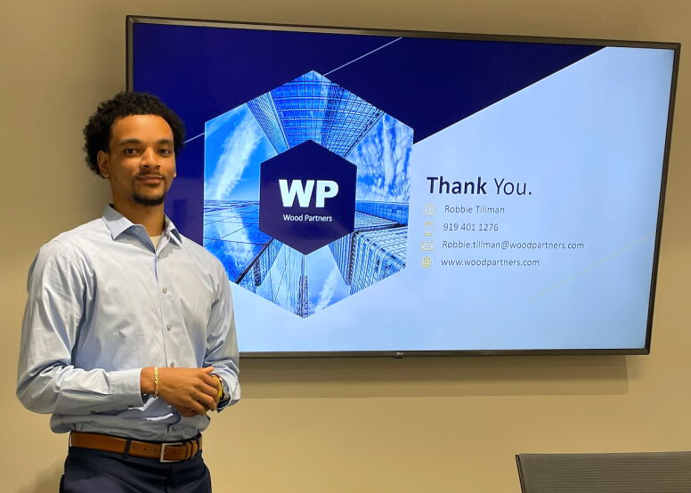 Robbie Tillman presents his final presentation at Wood Partners.