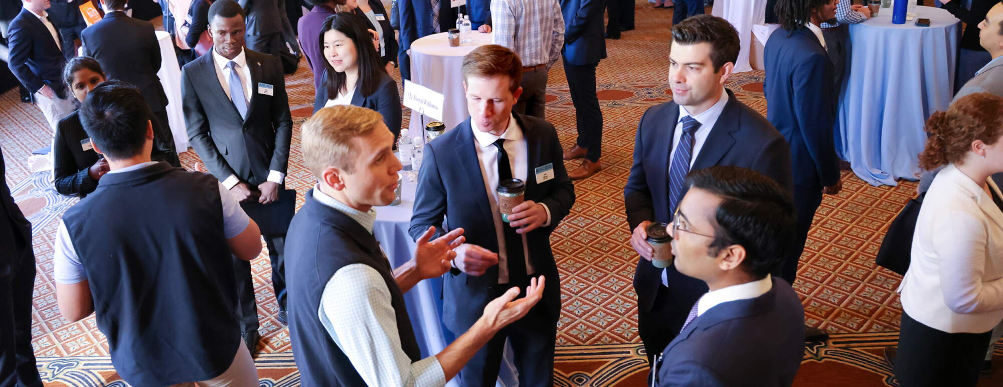 Students talking with a recruiter at an event