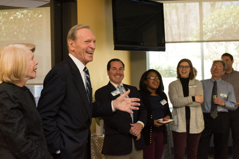 Bill McCoy with wife and staff
