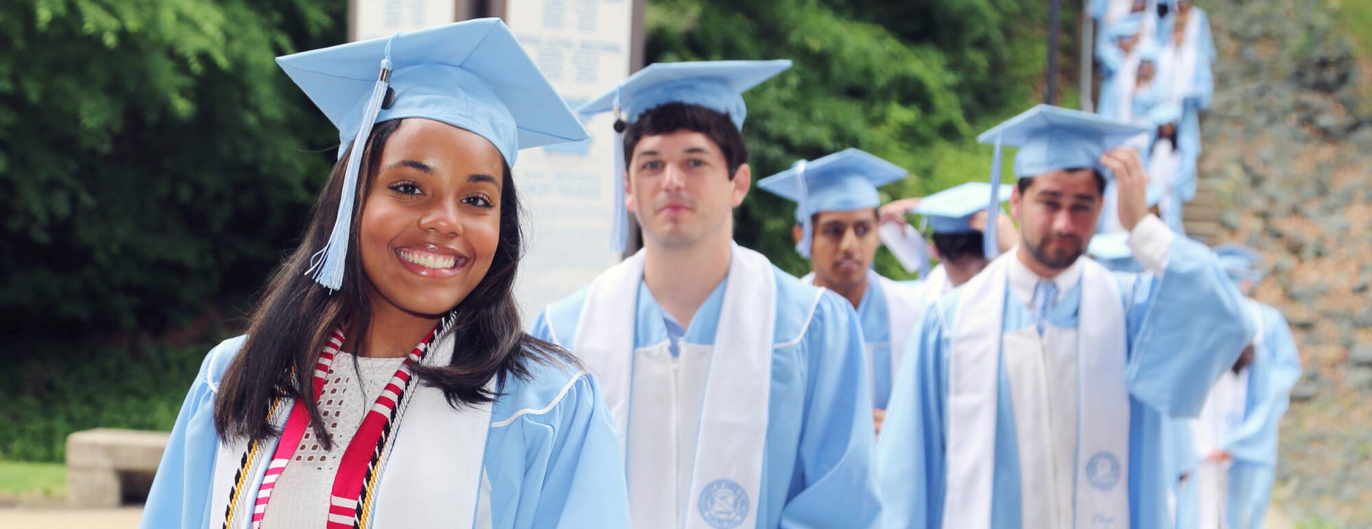 Undergraduate business students at graduation