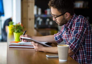 Woman on laptop choosing MBA recommenders