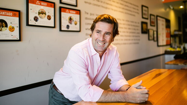 Hernan Moyano (MBA '02) inside the Durham location of Makus Empanadas.