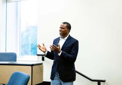 Sekou Bermiss teaching in a classroom