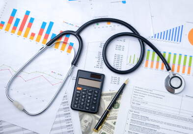 Stethoscope with Pen, Charts and Graphs, Finance, Account, Statistics, Investment, Analytic Research Data, Medical and Insurances Concept