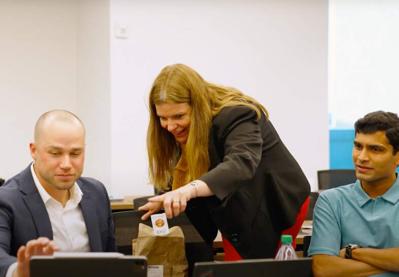 Professor Eva Labro with students
