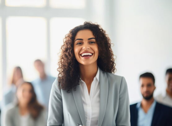 Woman smiling in a crowd
