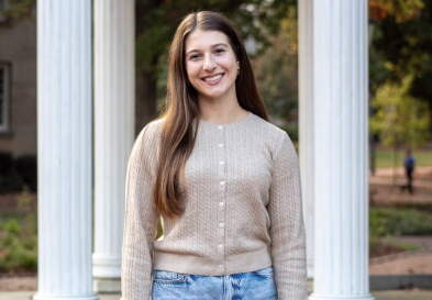 Elizabeth Kohn in front of the Old Well.