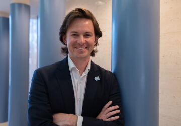 Landon Clifford (MBA ’25) with his arms crossed.