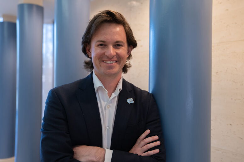 Landon Clifford (MBA ’25) with his arms crossed.