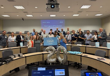 STAR celebrates its 20th Anniversary with a group photo.