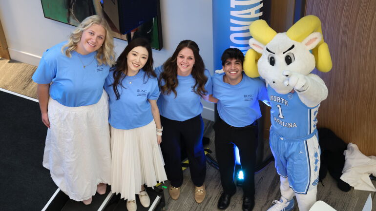 A group of students pose with Rameses.