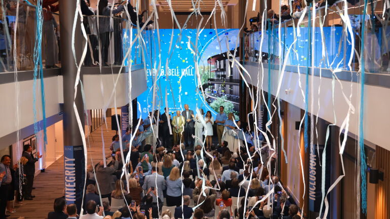 Streamers fall over the grand opening event.