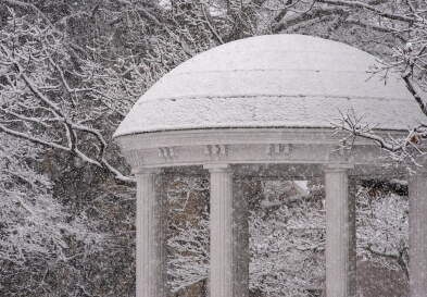 The top of the Old Well covered in snow. (Jon Gardiner/UNC-Chapel Hill)