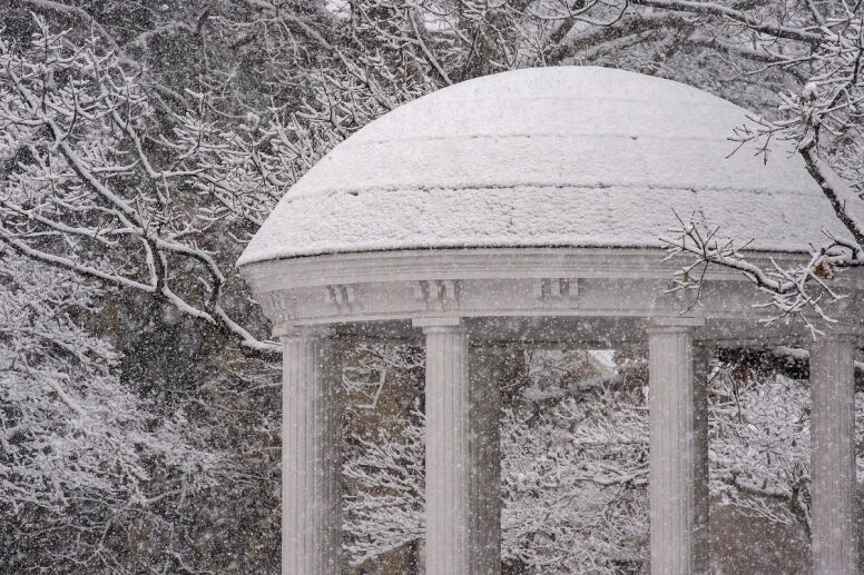 The top of the Old Well covered in snow. (Jon Gardiner/UNC-Chapel Hill)