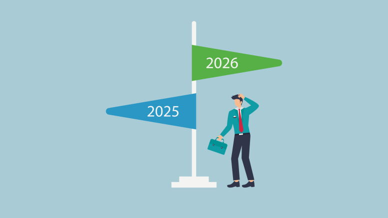 Businessman confused between flags that read 2025 and 2026.