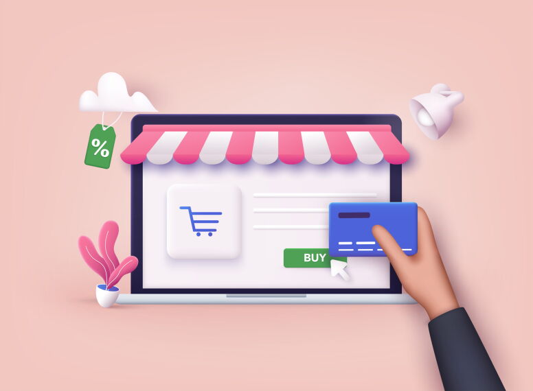 Hand holds a credit card to buy on an illustrated online store displayed on a laptop.