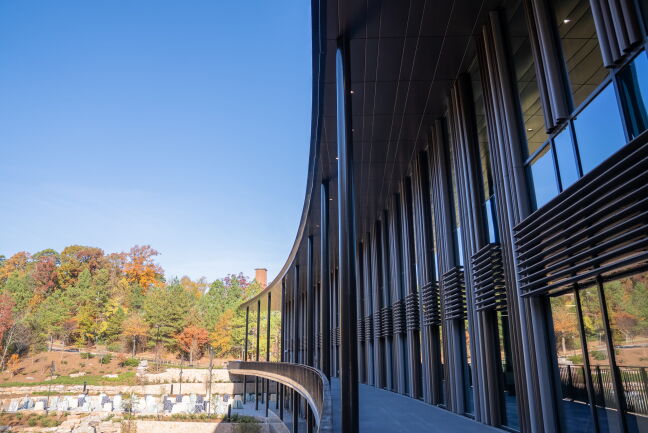 An outside view of the curvature of Bell Hall.