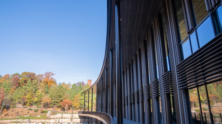 An outside view of the curvature of Bell Hall.