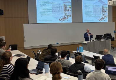 Todd Williams, president at Grubb Properties, speaks to students in a Bell Hall classroom as a part of the ongoing Housing Affordability Speaker Series. 