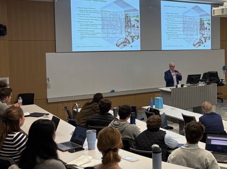 Todd Williams, president at Grubb Properties, speaks to students in a Bell Hall classroom as a part of the ongoing Housing Affordability Speaker Series. 
