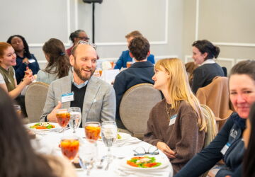 Professor Jeff Mittelstadt speaks with the student who nominated him at the Morehead-Cain Faculty Appreciation Luncheon.