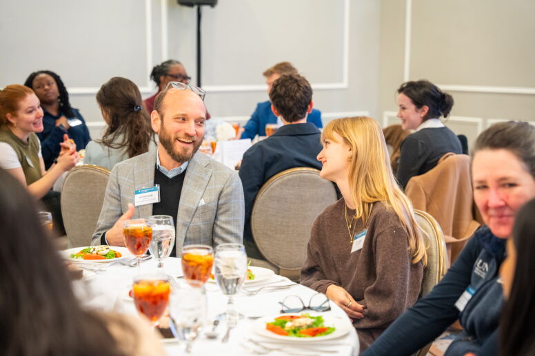 Professor Jeff Mittelstadt speaks with the student who nominated him at the Morehead-Cain Faculty Appreciation Luncheon.