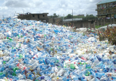 Large mound of plastic water bottles sitting outside