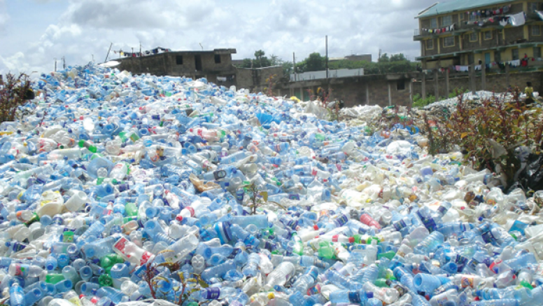Large mound of plastic water bottles sitting outside