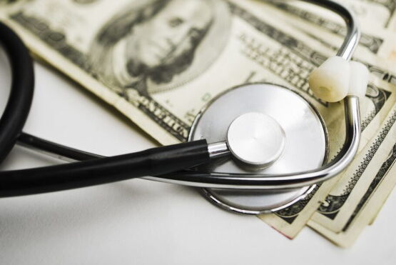 money and stethoscope