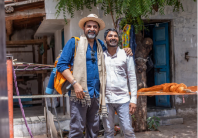 Kunal Desai with a local weaver in Kutch, Gujarat, India.