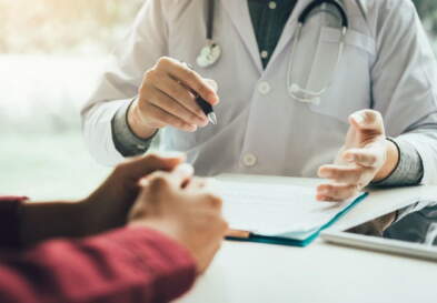 Doctor and patient talking with hands