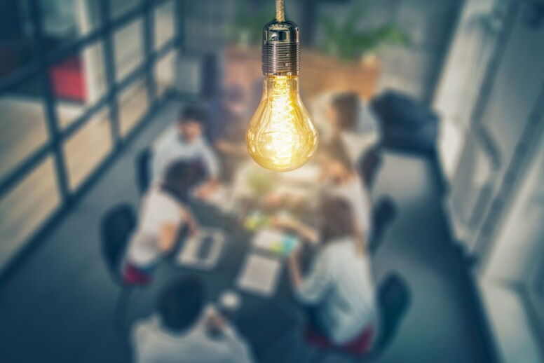 light bulb over a team