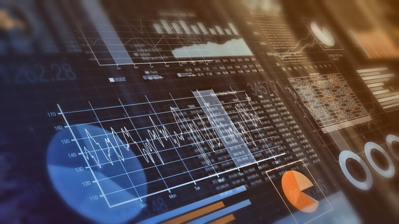close-up view of financial graphs, bar, circle and line charts (3d render)