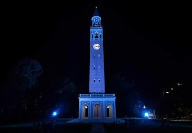 The Bell Tower lit blue at night