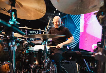 Chris Marquart (MAC '24) plays the drums.