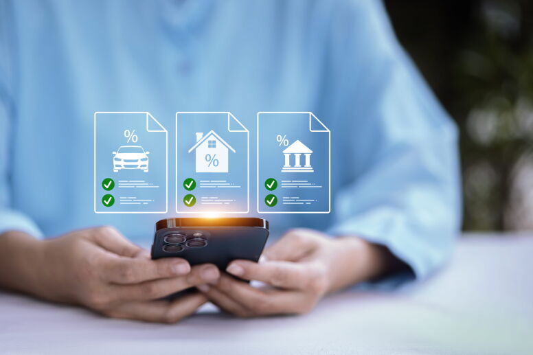 Person using smartphone with digital loan comparison