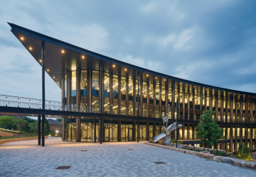 Bell Hall glows at dusk. Photo by Bruce Damonte.
