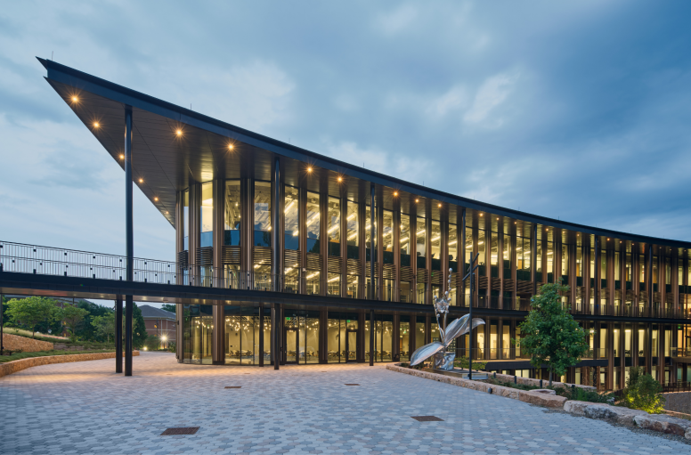 Bell Hall glows at dusk. Photo by Bruce Damonte.